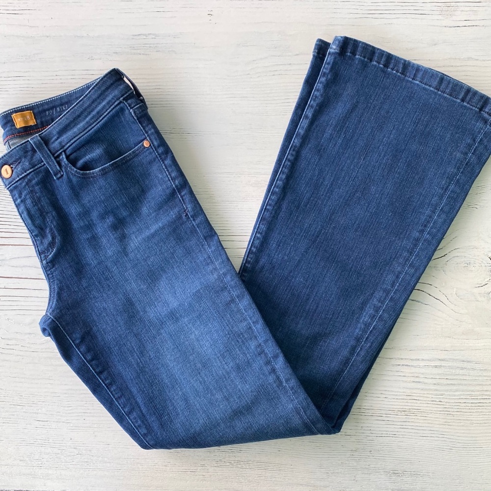 Pilcro Anthropology slight bell bottom jeans.